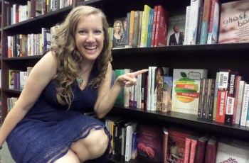 Sunshine Rodgers pointing her book at Barnes and Noble